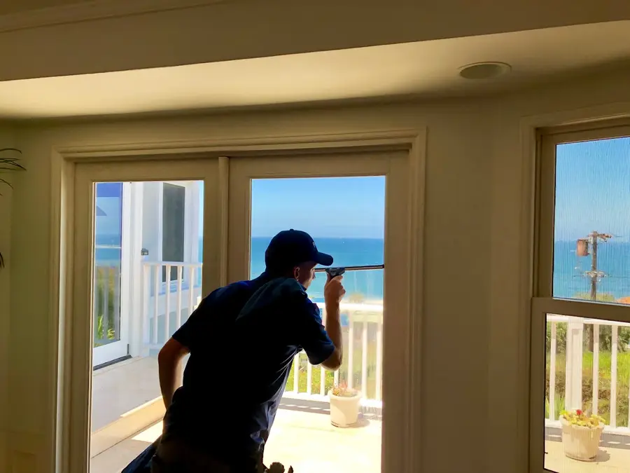 Fall window cleaning at LA hillside property with skyline view